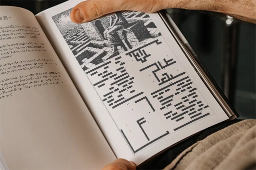 The book held open at a maze puzzle